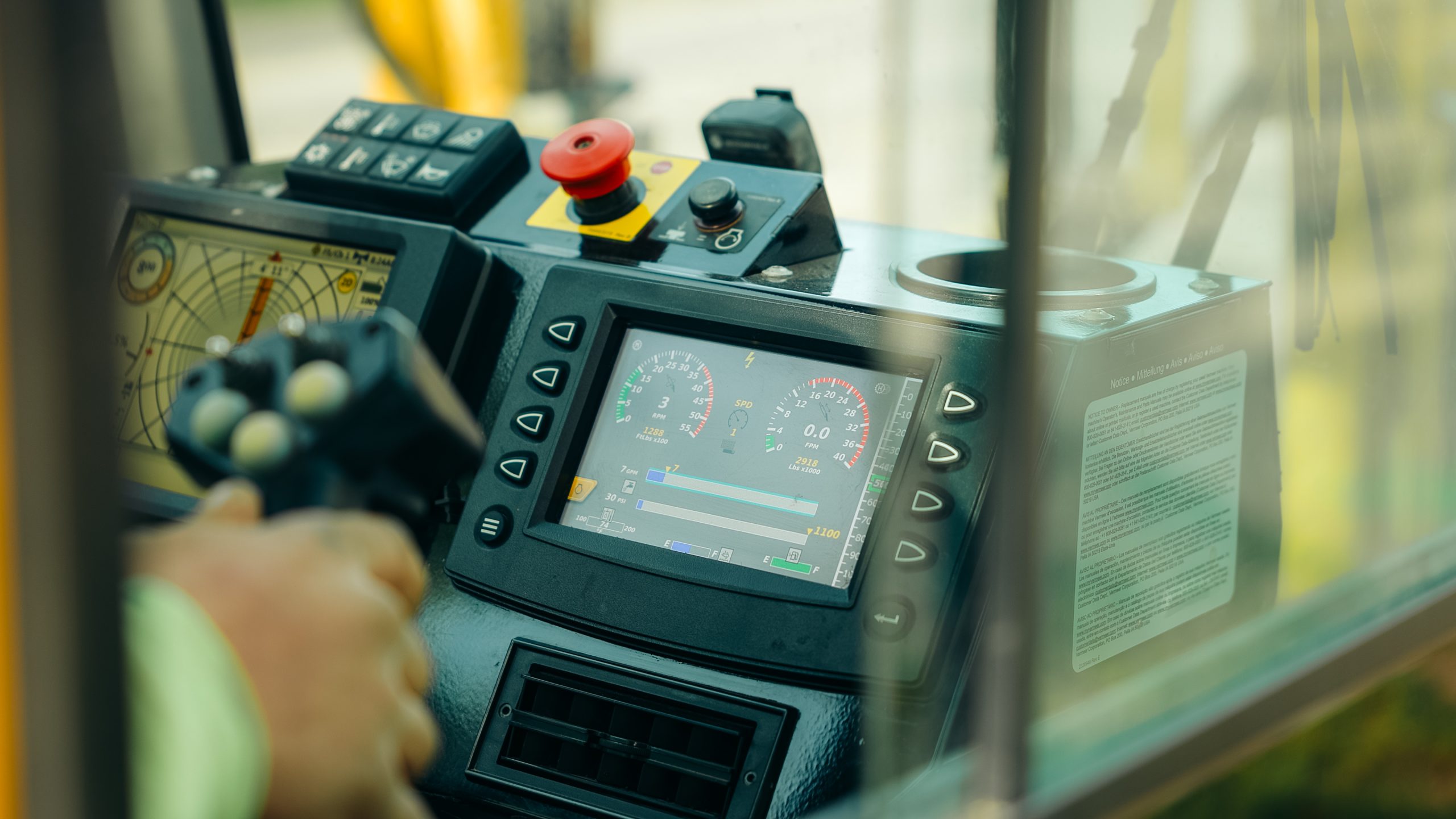 Atlas HDD operator at the controls of a horizontal directional drilling rig